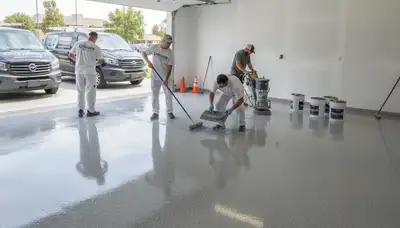 Epoxy garage floor coating applied by professional painters in Buffalo, NY for durable concrete protection
