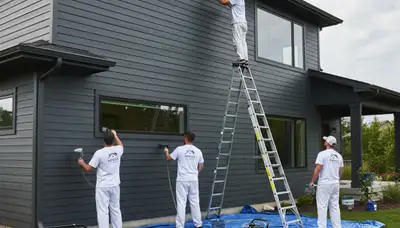 Professional siding painting on Buffalo NY home for durable, weather-resistant exterior finish